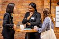 three people chatting